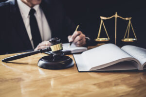 A solicitor sits at a desk working on a cervical cancer misdiagnosis claim.