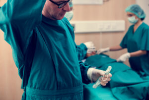 Group of surgeons in their scrubs in theatre