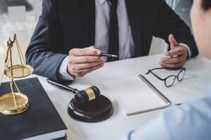 A solicitor explaining what you need to prove medical negligence claims to a client
