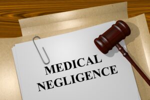 Paperwork on a desk that reads 'Medical Negligence'
