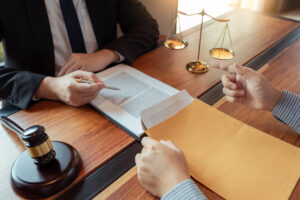 A specialist medical negligence solicitor discusses a claim with their client 