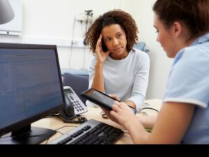 Concerned relative discussing compensation claim for MRSA infection with an NHS worker.